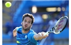 EASTBOURNE, ENGLAND - JUNE 21:  Feliciano Lopez of Spain returns against Richard Gasquet of France during their Men's Singles Finals match on day eight of the Aegon International at Devonshire Park on June 21, 2014 in Eastbourne, England. (Photo by Jan Kruger/Getty Images)